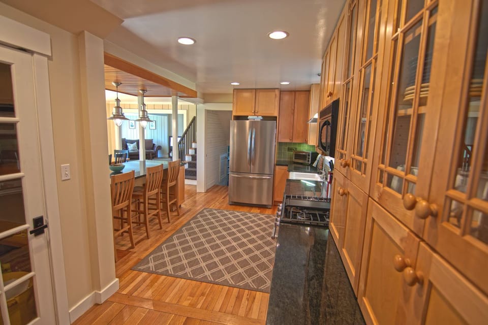 Step up from family room into large open Kitchen, all new appliances