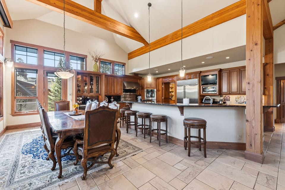 Dining Room with separate wet bar with wine refrigerator
