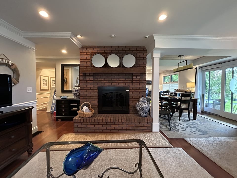 First floor living room with walk-out to the beautiful backyard. 