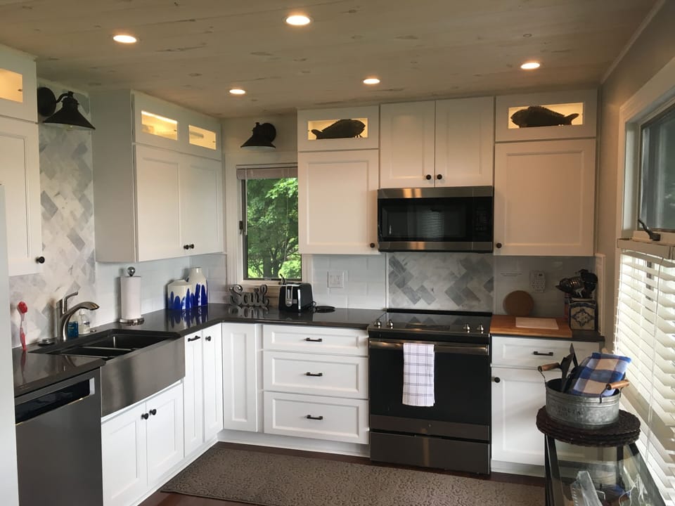 Full kitchen on the first floor, fully stocked with cookware and all essentials.