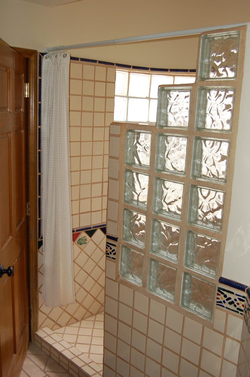 Bath #2 tile work in shower,
Double sink, private toilet.