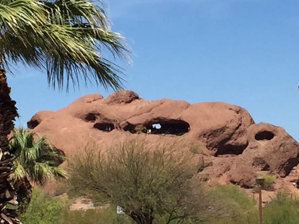 Hike up to the Hole in the Rock in nearby Papago Park