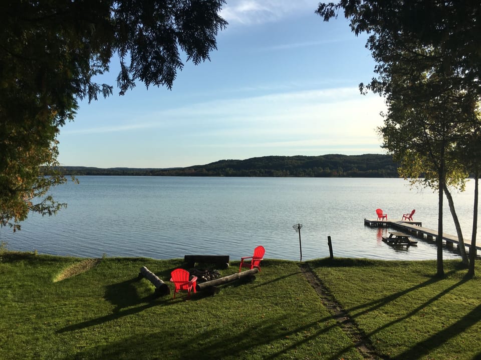 Sandy bottom beach with bonfire pit, dock and basketball hoops!  