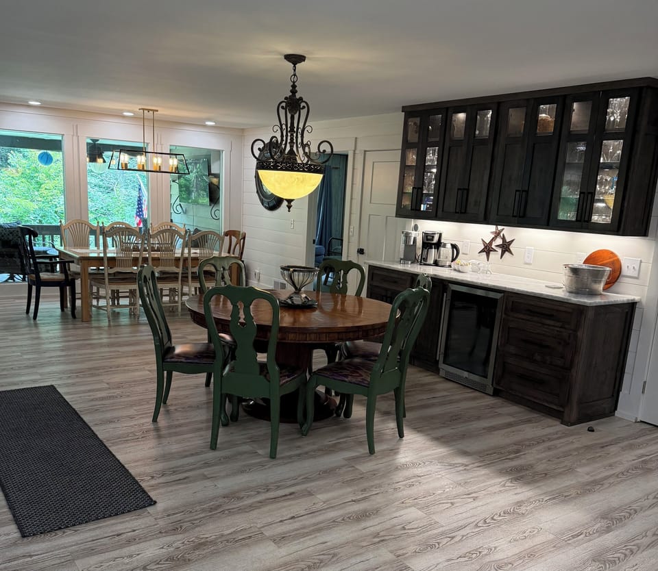 Coffee & Beverage Bar. 60" round table for breakfast, dining  & games.