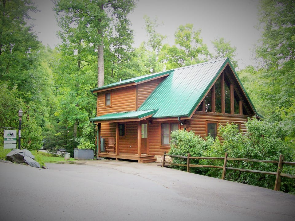 Level driveway for 2-3 cars.  One step into cabin.