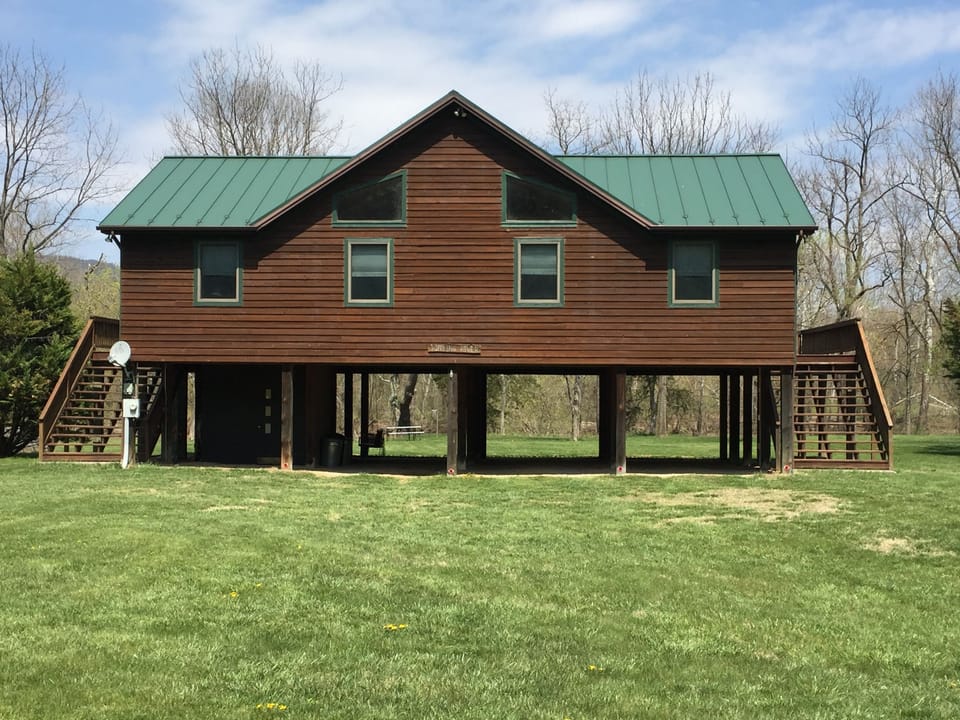 Back of house facing driveway and private lane