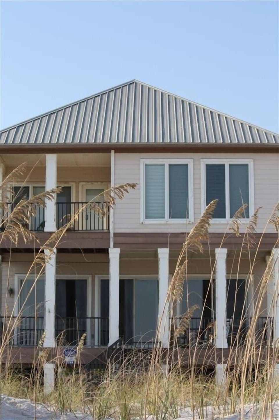 A view of all the sliding glass doors from the Gulf side