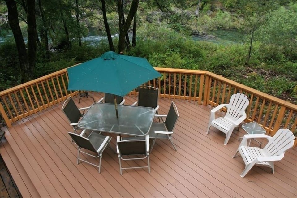 A portion of our deck showing proximity to the river, a "stones throw".