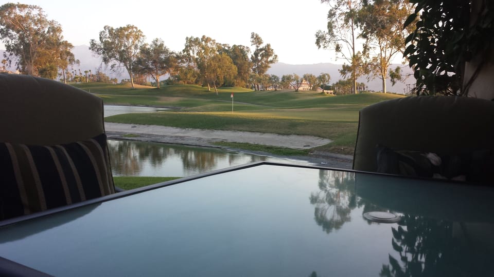 Outside dining on lake and #12 Par 3 green 