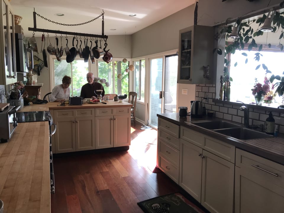 Butcher block counters. New exotic wood floors thru out. More great views.