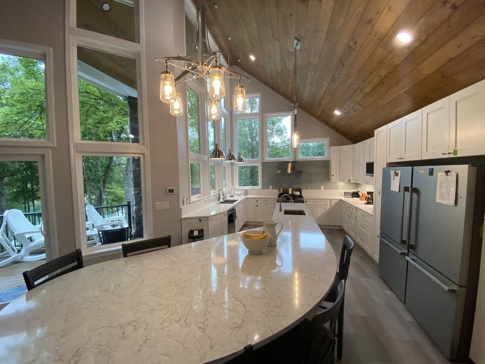 Chef's Kitchen Island with bar stools
