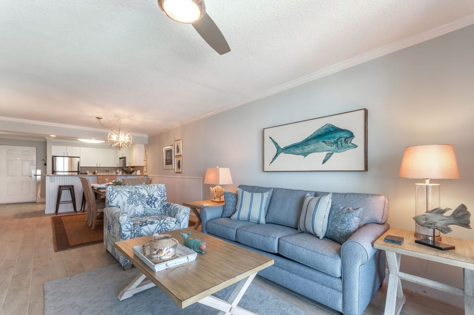 Commissioned fish painting by local artist highlights the living room.