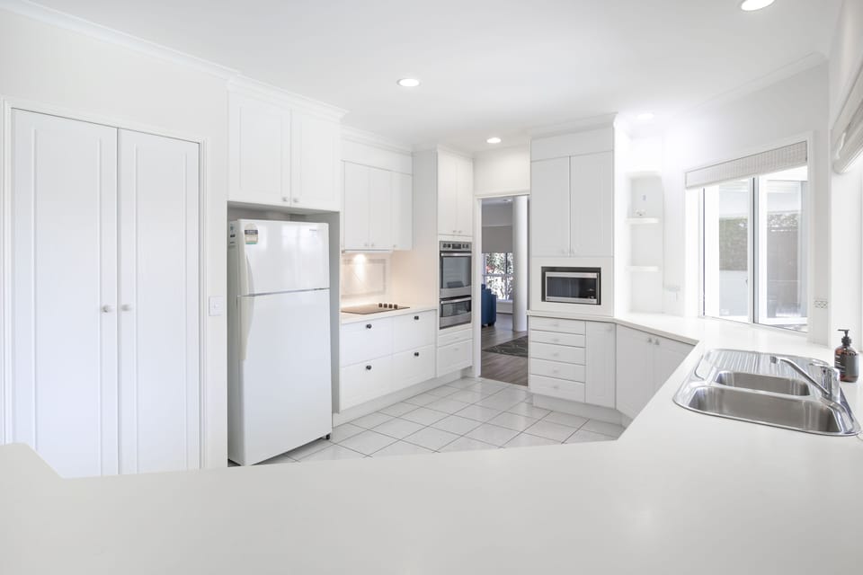 Huge kitchen with modern appliances & walk-in pantry.