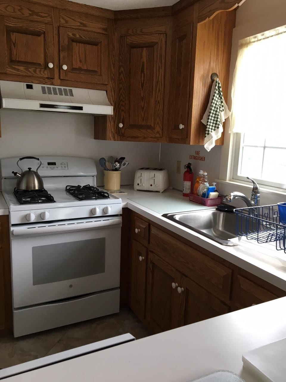 Kitchen overlooks back deck