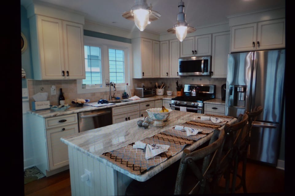 State of the art kitchen with LG appliances and center island  w/seating for 3  