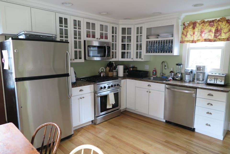 Kitchen with stainless steel appliances and granite countertop