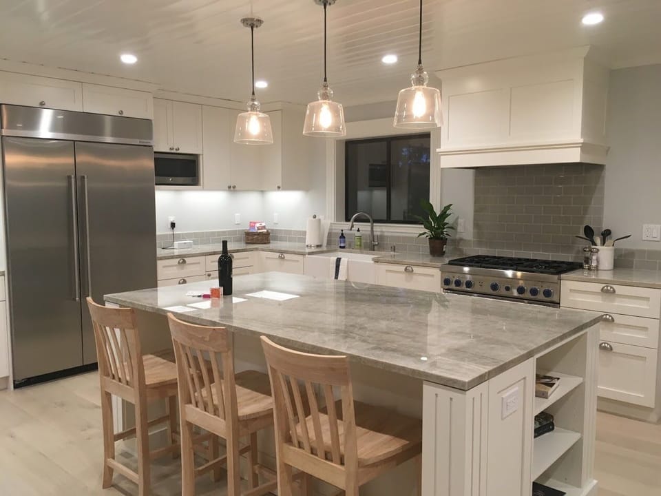 Spacious kitchen with island,  Thermador gas range and large built-in fridge