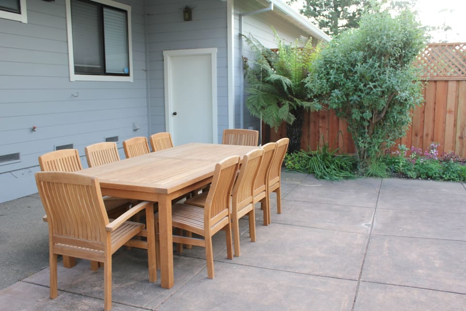 Outdoor dining table with seating for ten (also BBQ grill)