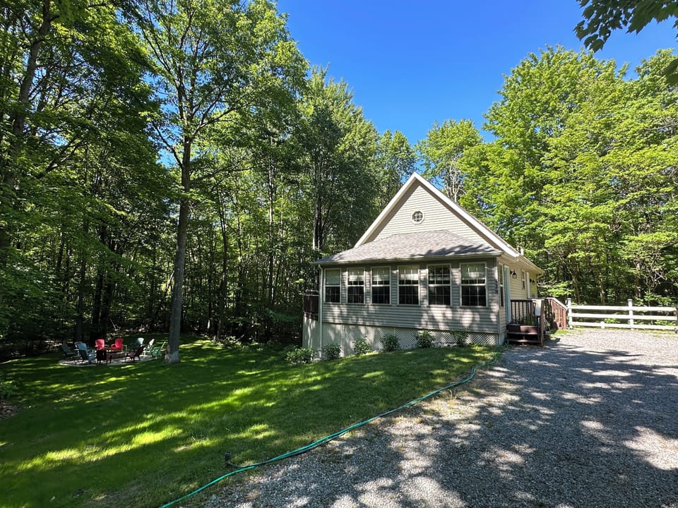 Privacy awaits at this luxury cabin on a large wooded lot in Floradale.