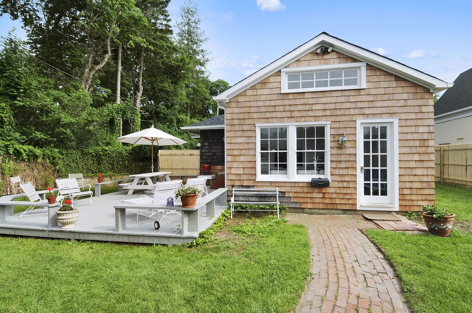Deck and lawn enclosed on all sides for privacy