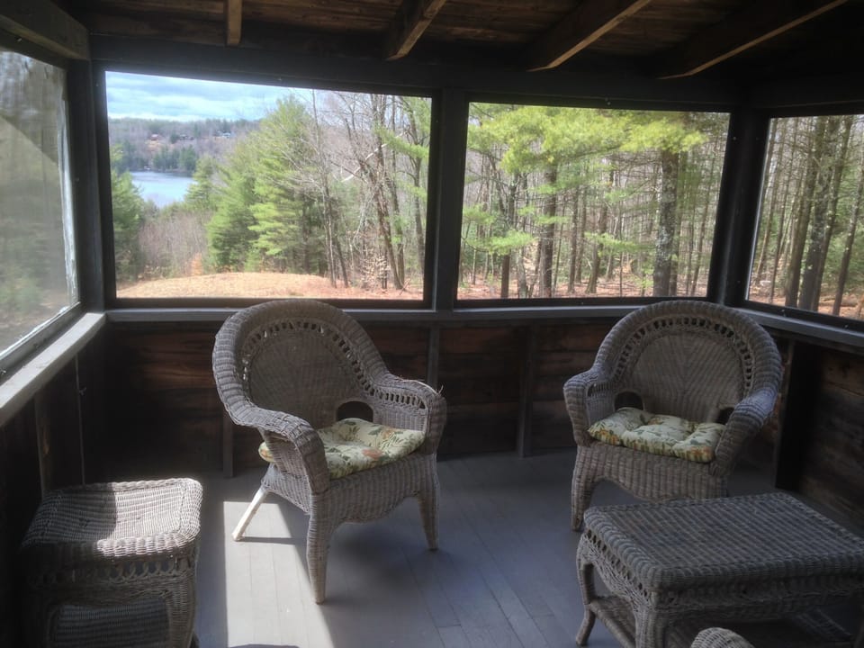 Screened Sitting Porch off of Green Master Bedroom