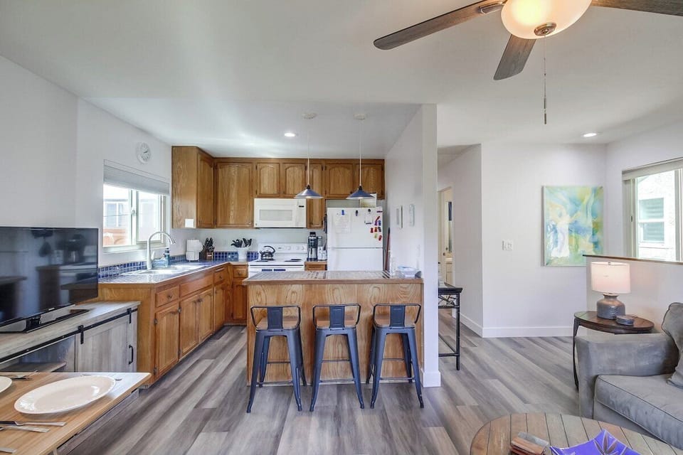 Open floor plan with living room, dining and kitchen