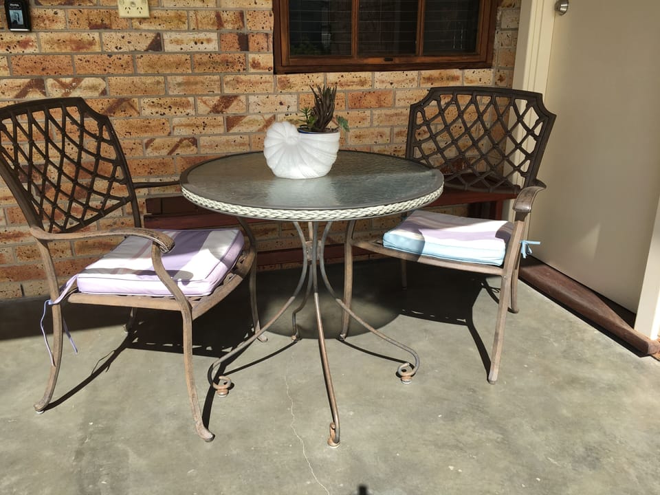 Enjoy breakfast or a relaxing wine on the back patio.