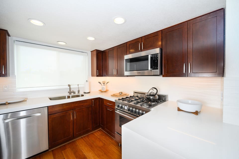 Kitchen - dishwasher, microwave, gas range.