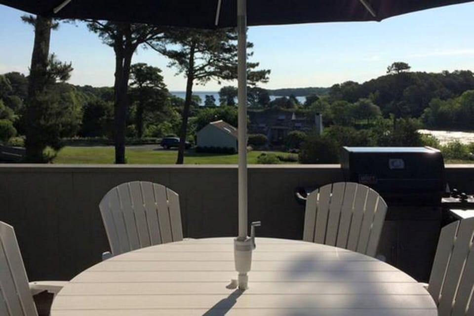 Our deck features comfy swivel rockers and includes a gas grill. 
