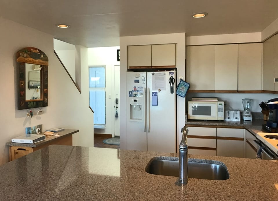 Fully equipped Kitchen including Ice Maker, Dishwasher, Microwave Oven & Stove.