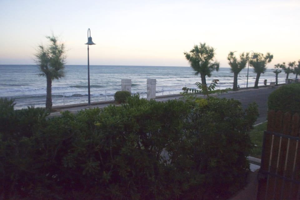Front gate to street & beach.
