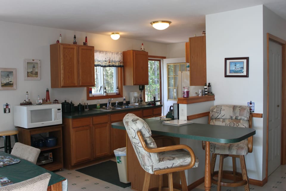 Fully stocked kitchen with side door entry