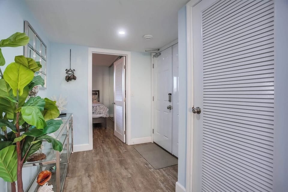 Entrance to guest bedroom with in-suite full bathroom