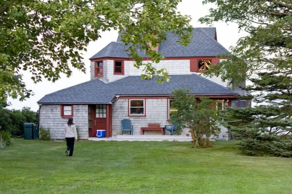 The back porch and yard - plenty of room for kids to play!