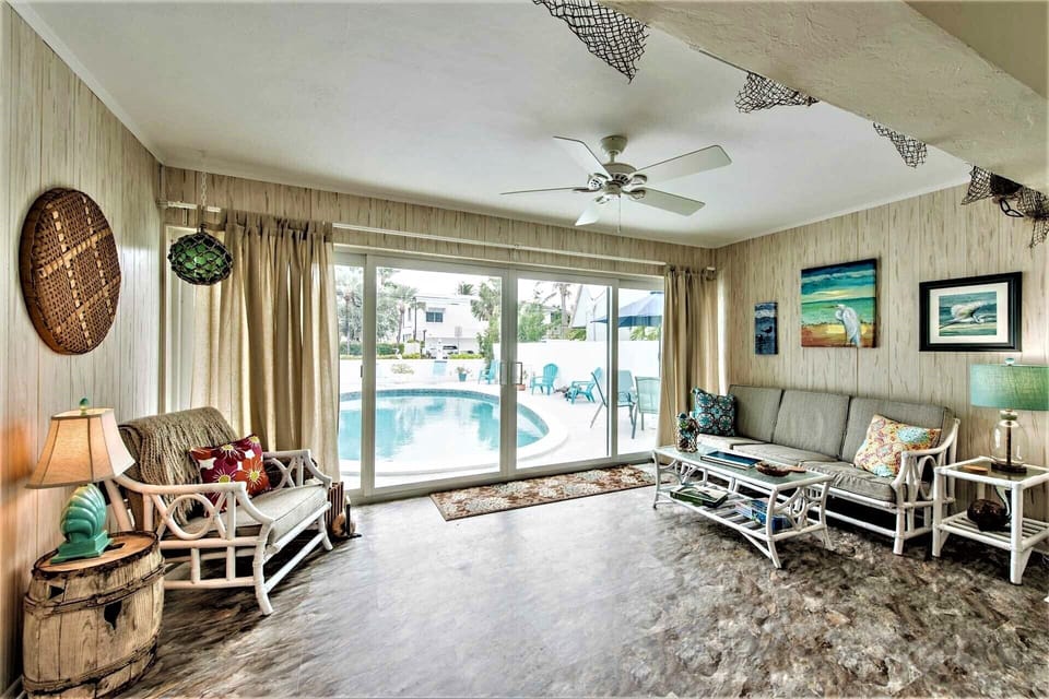 Open the new high impact sliding doors and bring pooside living indoors.