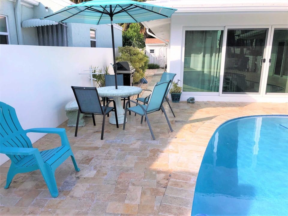 Dine at poolside after grilling on the new Charbroil gas grill.