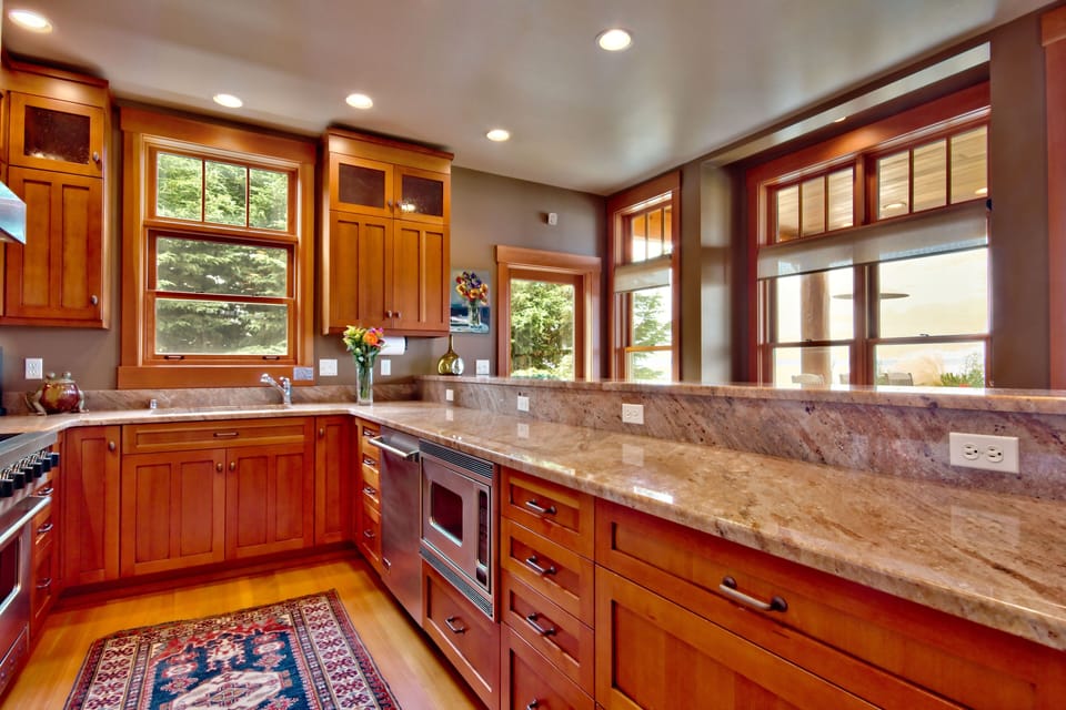 Custome Fir Cabinets, Stainless Appliances (induction cooktop), granite counter