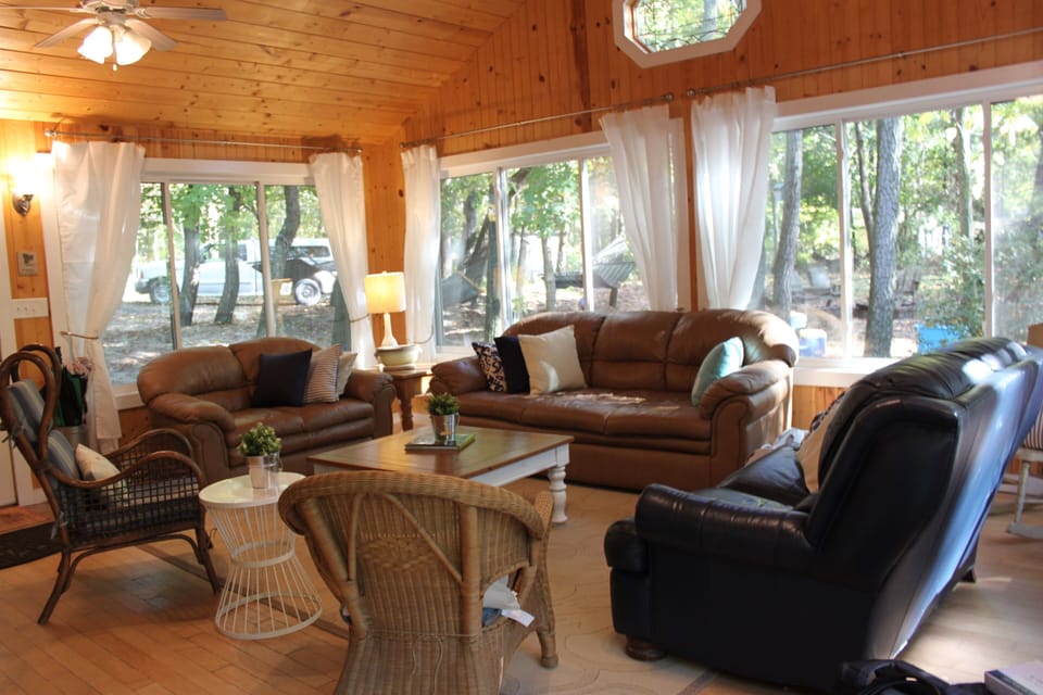 Main house living room area complete with queen sleeper sofa.