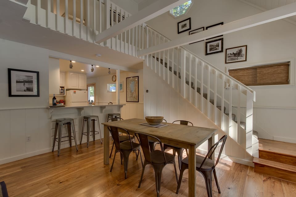 RH dining room table opens up for a larger gathering over the holidays.