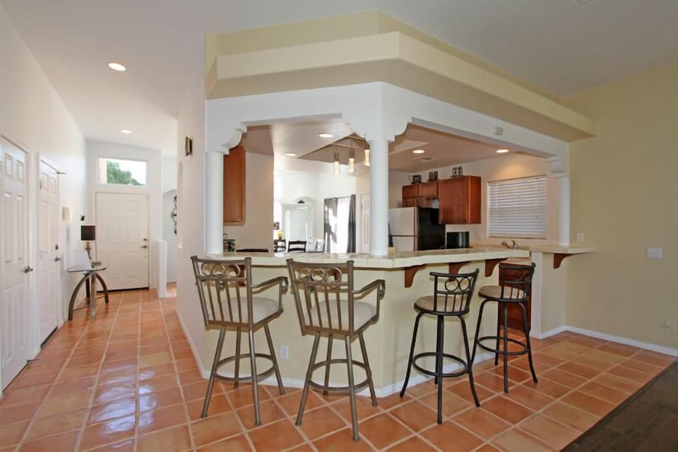 Front entry and kitchen island.