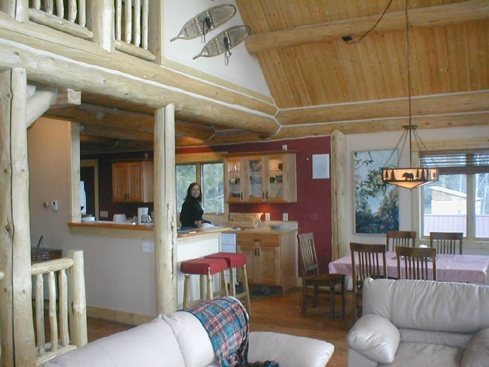 Inside Log Home w/ Wood Floors and High Ceilings