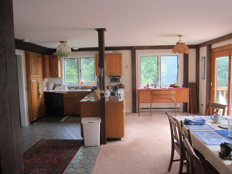 An open plan allows lots of socializing while making meals, and a great view too