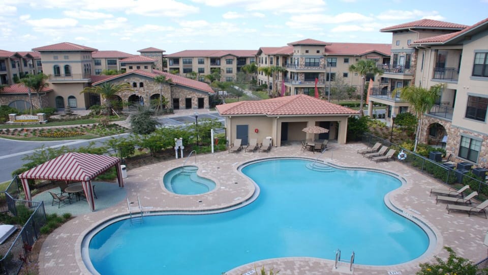One of two beautiful communal pools with loungers, kids' splash pad, jacuzzi