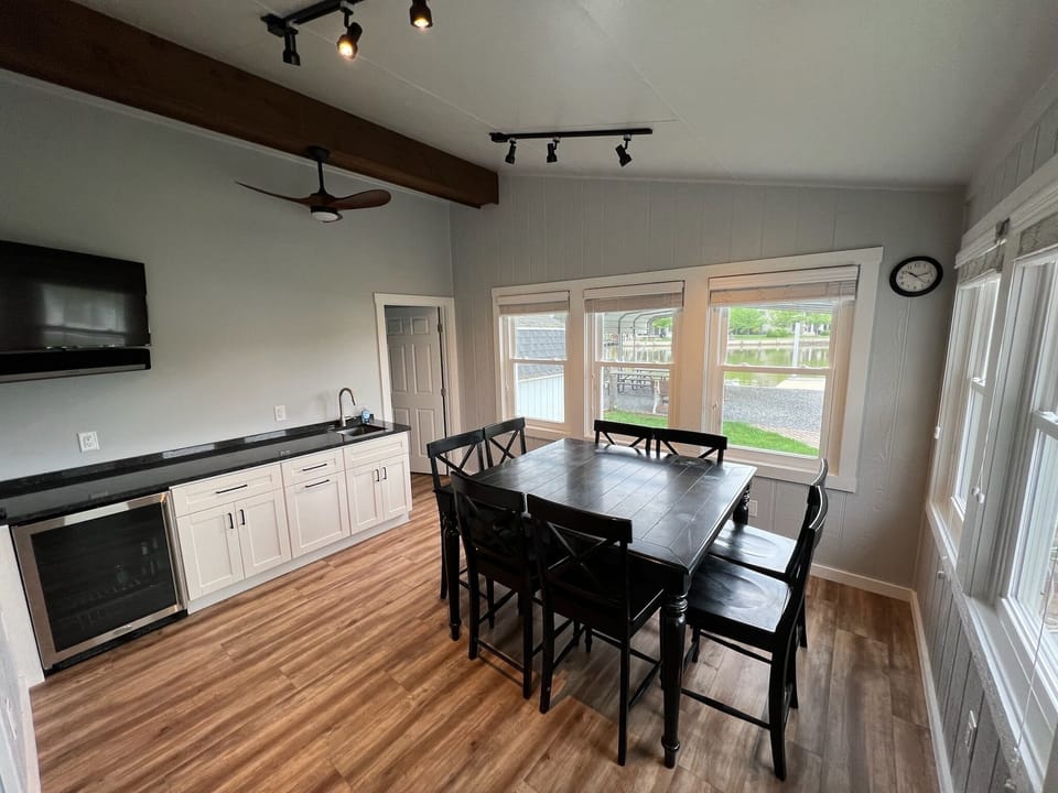 Porch with wet bar, mini fridge and bathroom.  Climate controlled. 