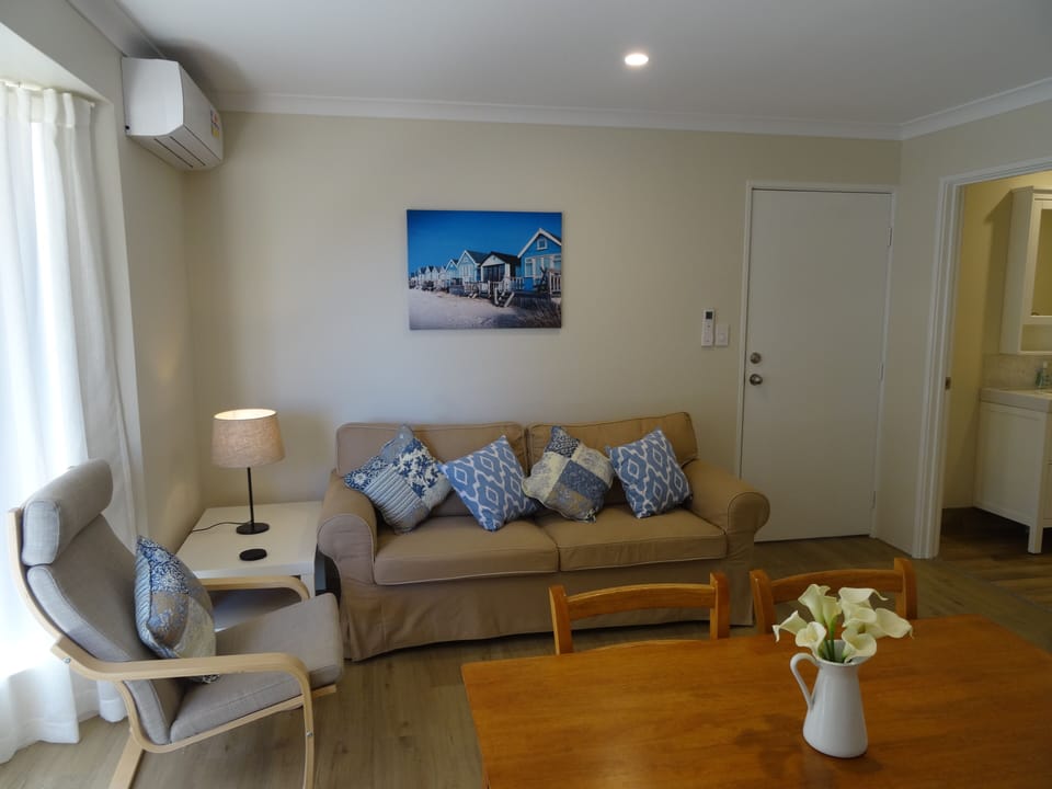 Open plan living area- dining and lounge room 