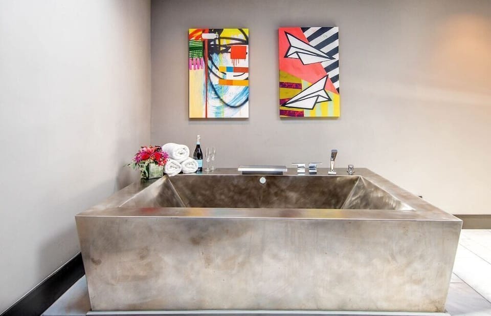 Spa-Inspired Primary Bath with Stainless Soak Tub