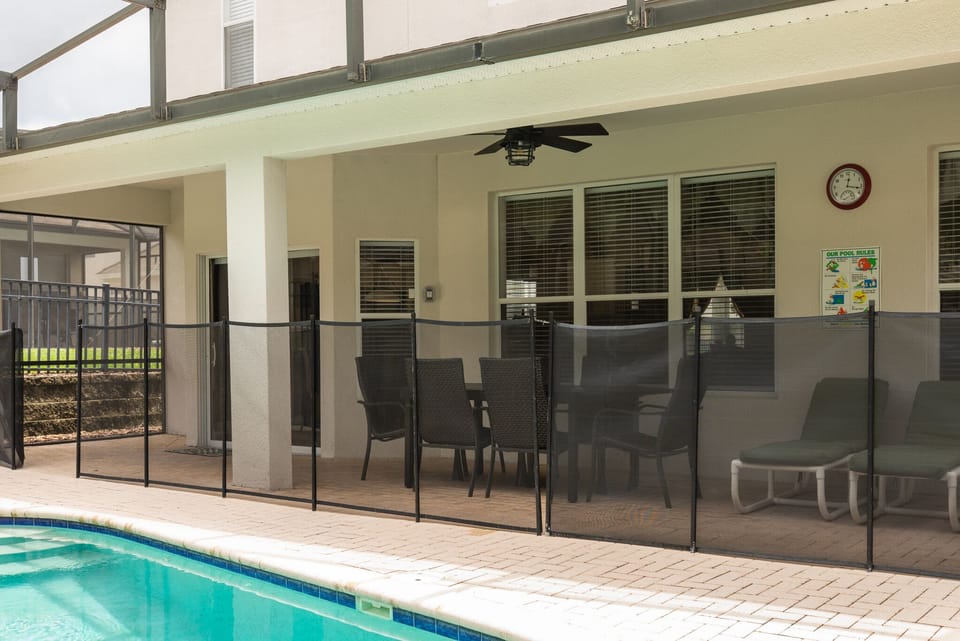 Patio table and chairs along with loungers 