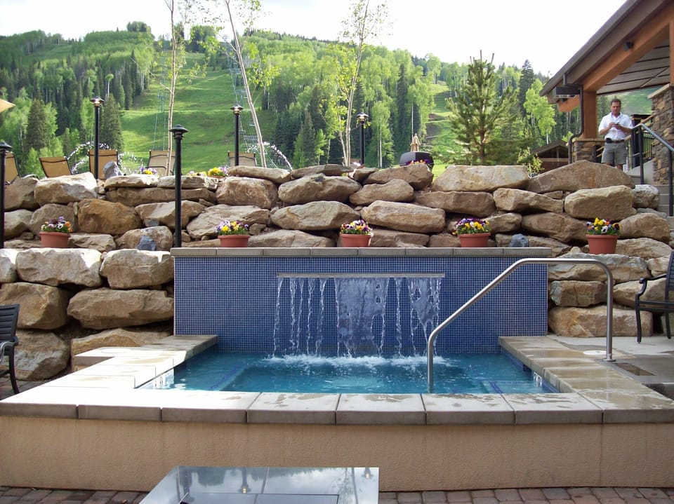 Relax in the private Durango Club hot tub or the one onsite