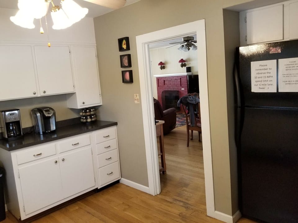 Keurig and 10-cup coffee maker provided; spice rack