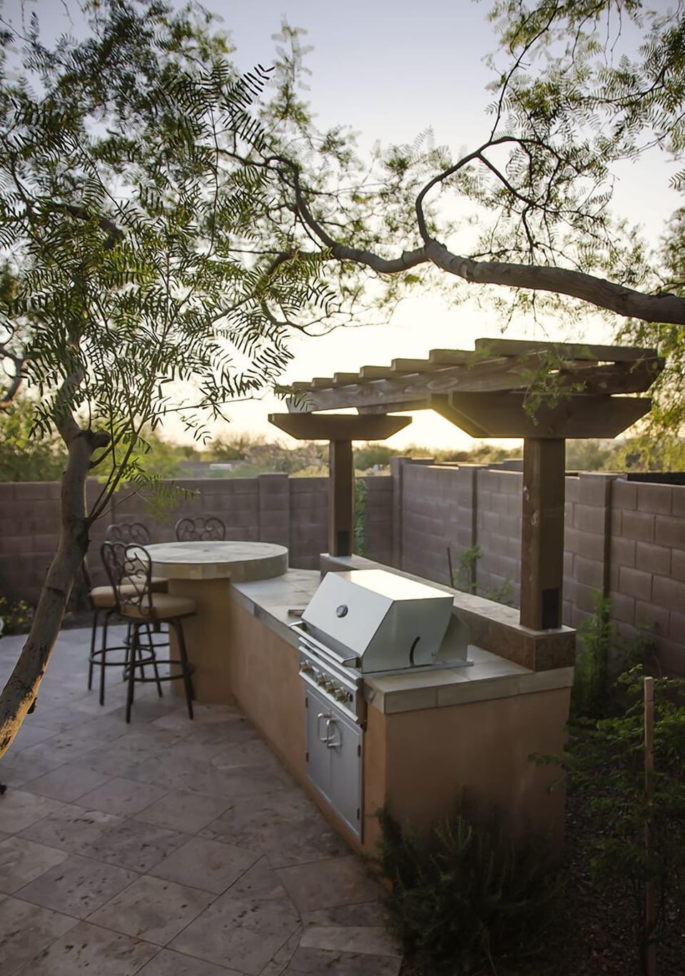 The backyard was completely renovated with an outdoor kitchen/gas grill.
